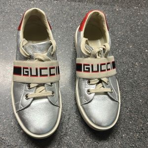 Silver Gucci kid’s sneakers